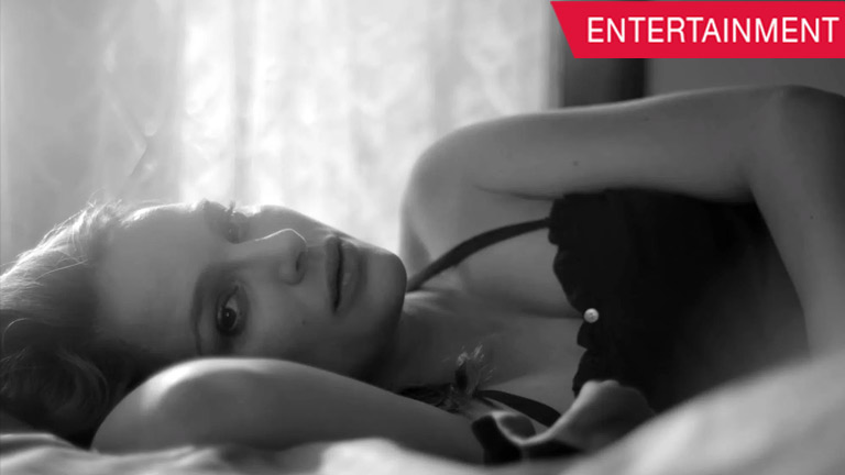 Watch a pregnant Natalie Portman swim underwater for a music video