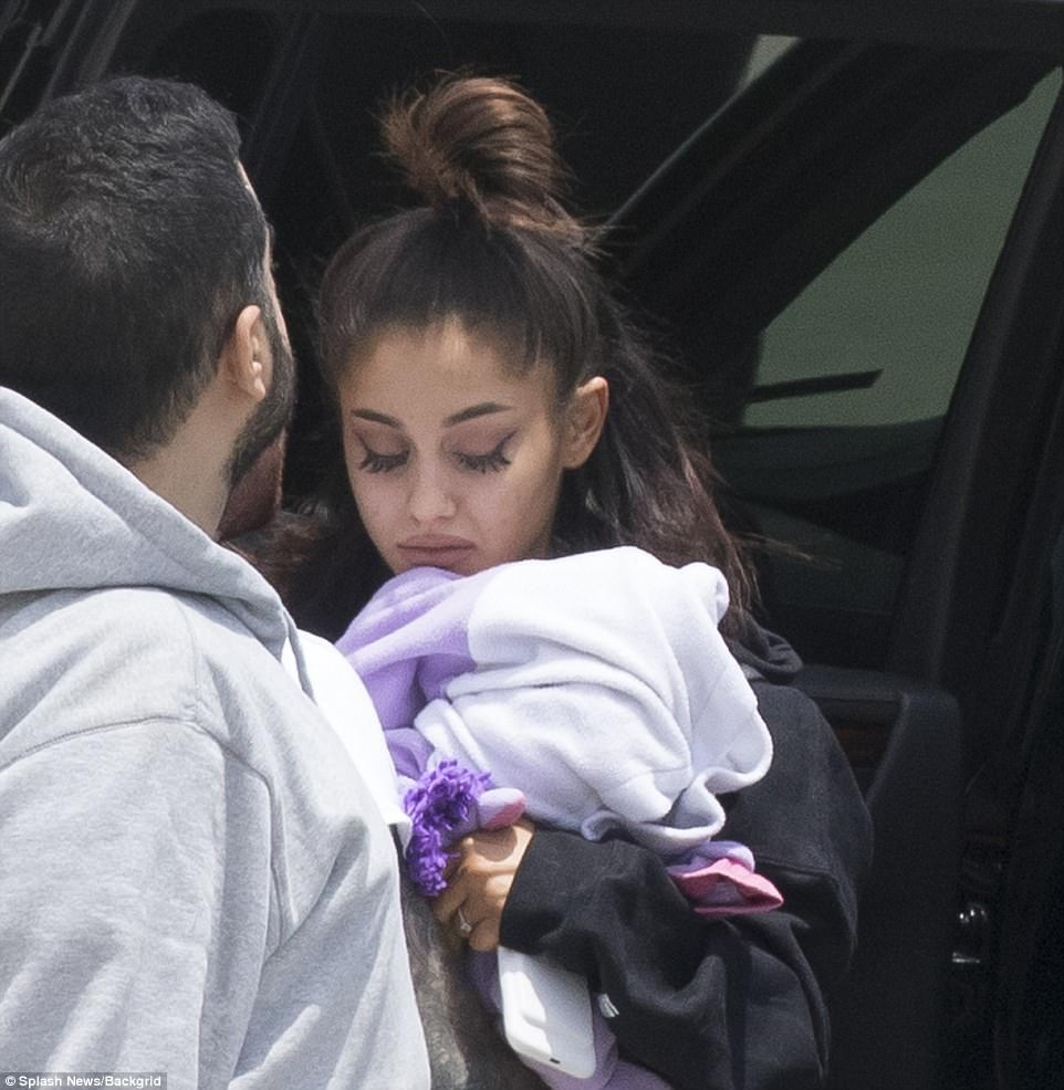 Ariana Grande looks devastated