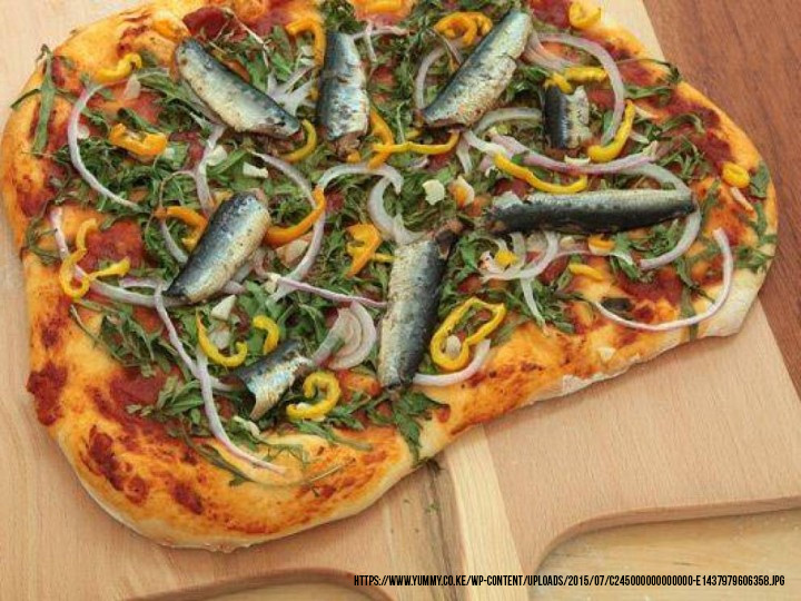 tuna, sardines, salmon, and onions pizza