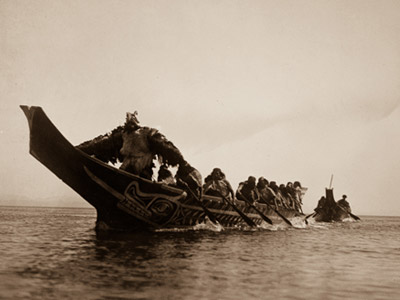 Kwakiutl-people-in-canoes-in-British-Columbia